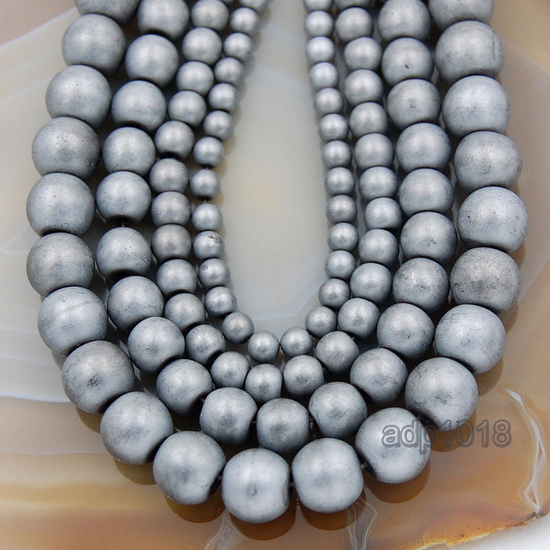 Matte Natural Metallic Hematite Gemstone Round Loose Beads on a
